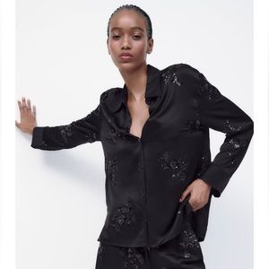 ZARA Satin shirt made of viscose.